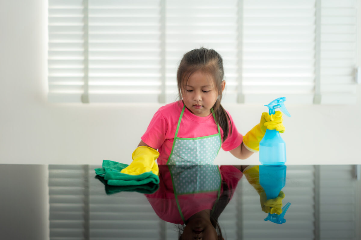 A child doing chores for mother's day