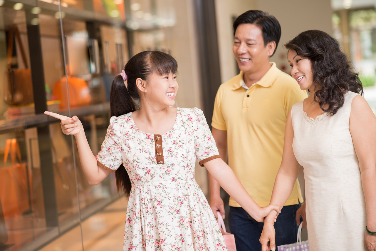An Asian family at a shopping mall