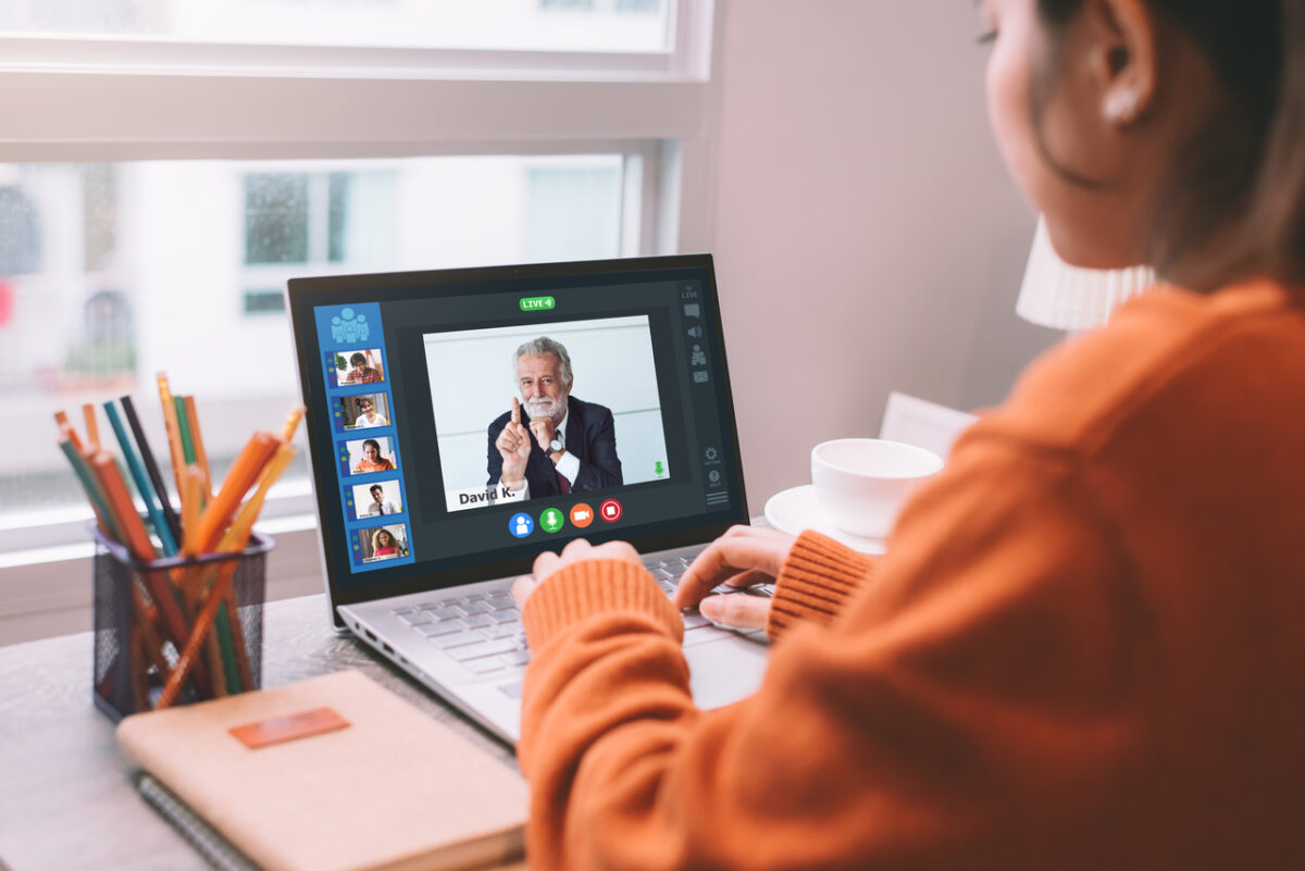 A woman attending a virtual event