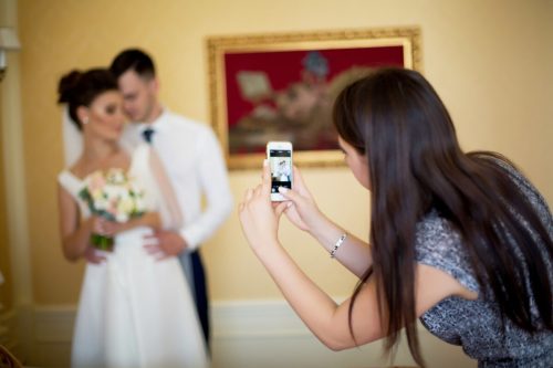 A couple streaming their wedding